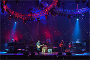 Mark Knopfler & Emmylou Harris distance stage shot with star lights